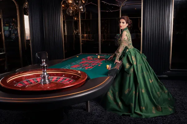 A glamorous woman holding casino chips in a neon-lit environment, representing the premium online casino atmosphere of JL56.