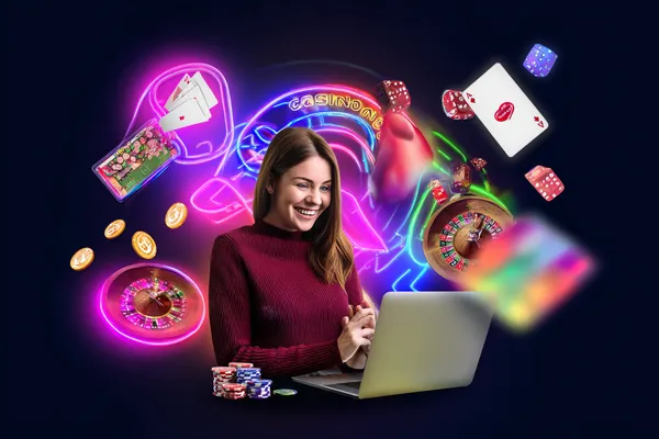 JL56 Games — Discover modern slots and table adventures A man celebrating a winning moment on his laptop while gaming symbols float around him, capturing the excitement of JL56 games.